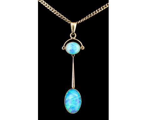 A modern gold coloured metal mounted opal set pendant, the oval cabochon cut opal of approximately 3ct suspended from a fine 