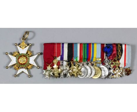 A gilt metal and enamel neck badge of Knight Commander of the Most Honourable Order of the Bath (military), and a group of si