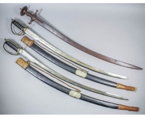 A modern Indian 1796 pattern sabre, the 31ins blade etched with running leaf and flower motifs and the golden temple, with ba