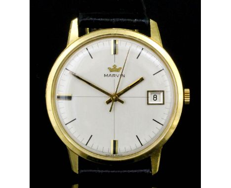 A 1960's gentleman's 18ct gold cased Marvin wristwatch, the champagne dial with baton numeral and date aperture contained in 