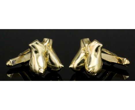 A modern pair of gentlemen's 9ct gold bare breast pattern cufflinks with T-bar fitting (gross weight 10.7 grammes)