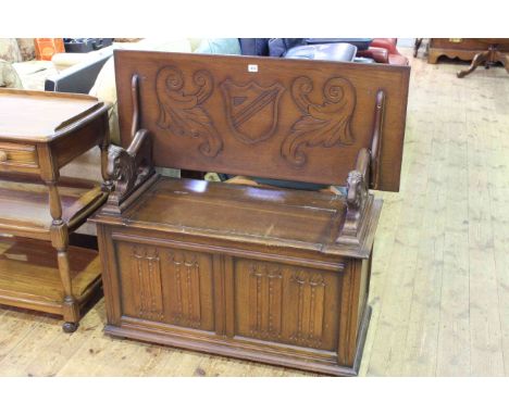 L. Marcus Ltd oak monks bench, 75cm by 106cm (closed).