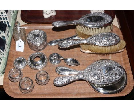 Silver backed brushes and mirrors, three silver salts, scent bottle, caddy spoon, etc.