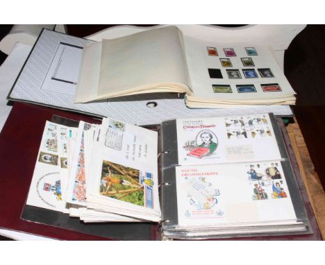 Assortment of first day covers in folders and loose (dating 1970's-1980's), face value GB stamps approximately £30, early USA