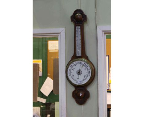 Oak banjo barometer with enamelled dial.
