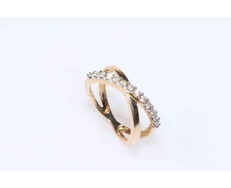 Diamond set yellow gold double crossover ring, size N.