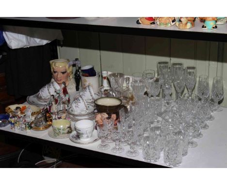 Shelf collection of ceramics and glass including Royal Doulton Mae West character jug, Gray's pottery, Belleek, etc.