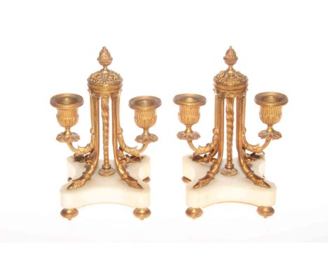 Pair Victorian gilt metal and alabaster two light candlesticks.