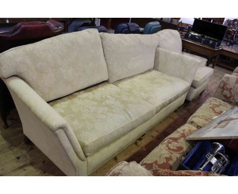 Three seater settee and chair in light yellow fabric.