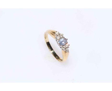 Diamond and gem set 18 carat gold ring.