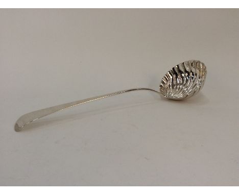 A George III silver "Old English" pattern soup ladle, with shell shaped bowl, London 1772