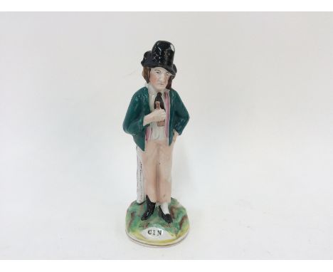 A Staffordshire figure, "Gin & Water", 22cm high