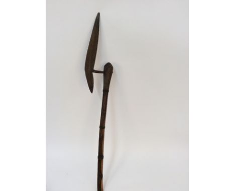 A tribal axe, with metal bound handle, 58cm 