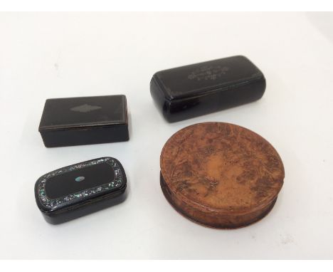 A 19th Century carved tortoiseshell snuff box, decorated with a country scene and inscribed "Le Patre", 8cm dia.; and three v
