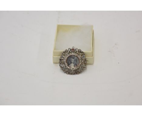 A Murrle Bennet & Co., silver and enamel decorated brooch, circa 1900, monogram to the reverse; and a silver and paste brooch