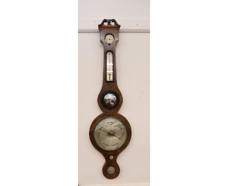 A 19th Century mahogany and boxwood strung banjo barometer, by Pearce of Grantham, scroll arch pediment above dry/damp meter,