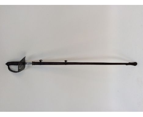 A 19th Century dress sword, by Harman of Calcutta, having basket hilt, shagreen grip and metal scabbard, blade 82cm long