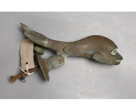 A Victorian cast bronze Dolphin door knocker,21cms long.