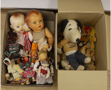 An assortment of soft toys, including Steiff and two dolls