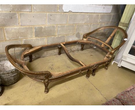 A 19th century French carved giltwood daybed frame, length 224cm, depth 90cm, height 75cm