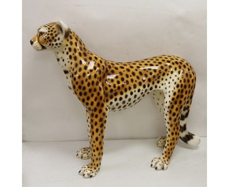 A large novelty ceramic leopard, 69cm tall
