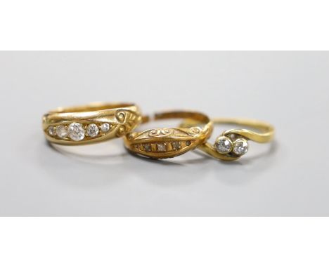 A late Victorian 18ct gold and graduated five stone diamond set half hoop ring, size M/N, a George V 18ct gold and diamond ch