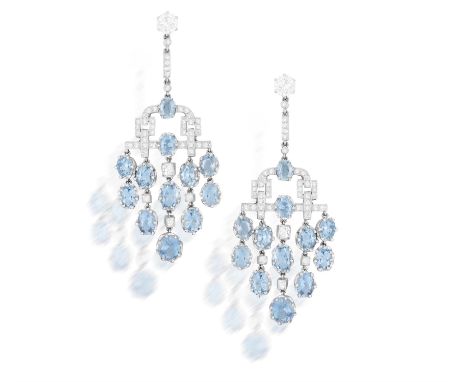 A PAIR OF EARLY 20TH CENTURY AQUAMARINE AND DIAMOND PENDANT EARRINGSOf chandelier design, the geometric mount millegrain-set 