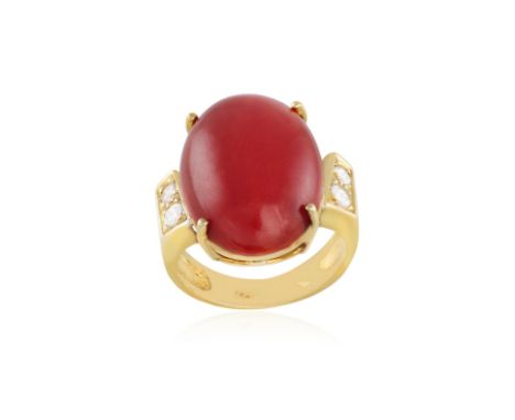 A CORAL AND DIAMOND RINGClaw-set with a cabochon coral, to brilliant-cut diamond shoulders, mounted in gold, ring size J** Th