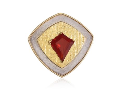 AN OPAL BROOCH, BY ANUSCHKA WOLFOf bi-coloured kite-shape design, centring a fancy-cut fire-opal, in silver and 18K gold, mak