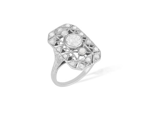 A Diamond ringThe central old-cut diamond, flanked by two smaller, old-cut diamonds, within an open, lattice-work surround, s