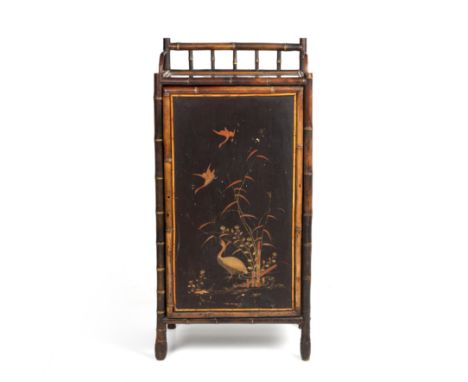 A late 19th century lacquered bamboo cabinet with a single door opening to reveal six drawers 47cm wide 30cm deep 100cm high.