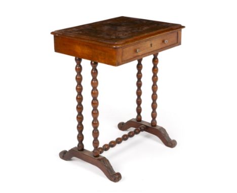 A Victorian walnut work table with bobbin turned supports 54cm wide 43cm deep 67cm high