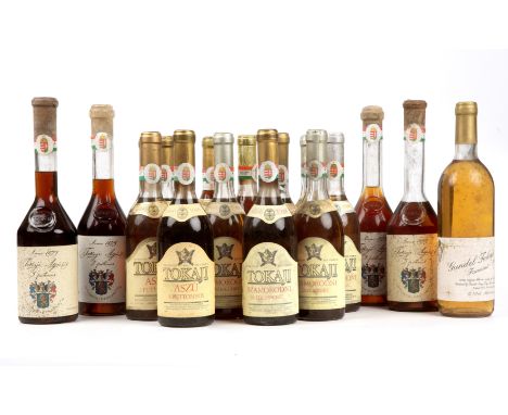 Eighteen Bottles of vintage Hungarian Tokaji (18)  Yes, the four larger bottles with irregular volumes of liquid and with bit