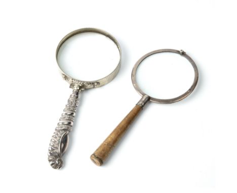 An early 20th century silver magnifying glass, with a shagreen handle by Asprey London, 7.5cm diameter 17.5cm in length toget