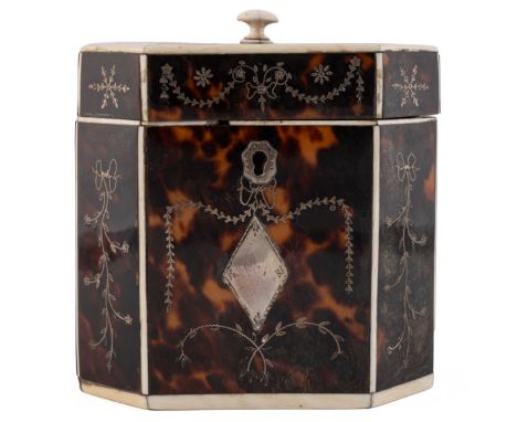 A George III octagonal tortoiseshell tea caddy with silver inlaid decoration and ivory borders. 10.5cm wide 7.5cm deep 11cm h