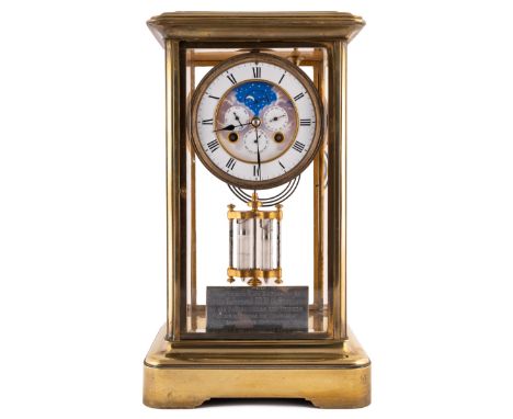A 19th century French four glass gilt metal mantle clock, the enamel dial with roman numerals, moonphase a subsidiary calenda