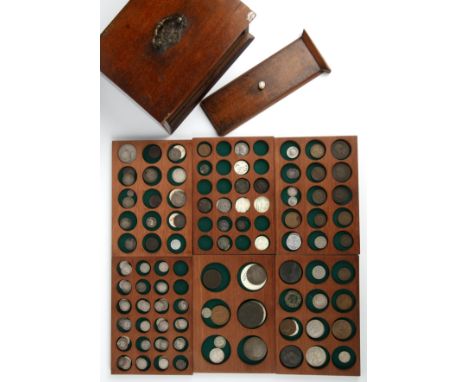 A cabinet on antique coins to include Roman coins, Gordian III, other coins George III 1787 shilling, 1797 cartwheel twopence