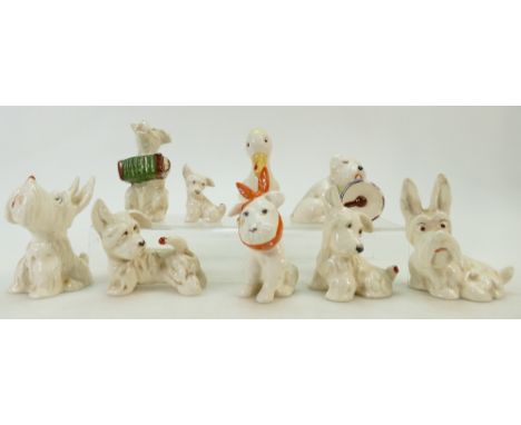 Beswick comical Dog collection: Figures including dog with accordion 811, dog asleep on drum, dog with ladybird on nose 804, 