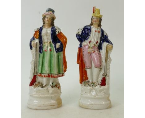 19th Century Staffordshire Type Figures of Man &amp; Woman: Wearing shooting regalia &amp; resting on rifles (hairline noted 