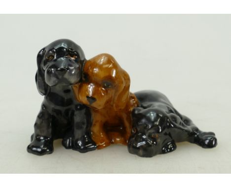 Royal Worcester miniature model of three Labrador puppies: Royal Worcester black mark 3130, length 8.5cm.