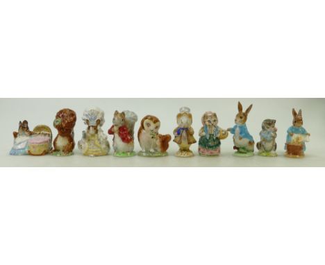 A collection of Beswick Beatrix Potter figures: Beswick gold marked Beatrix Potter figures comprising Squirrel Nutkin, Lady M