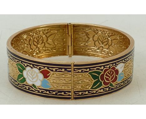  Enamelled gold coloured metal bangle (tested 18ct): Enamelled gold coloured metal bangle (tested for 18ct gold).  Of middle 