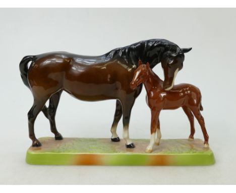 Beswick Mare and Foal on base: Beswick brown mare with Chestnut foal on ceramic grass base model 1811.