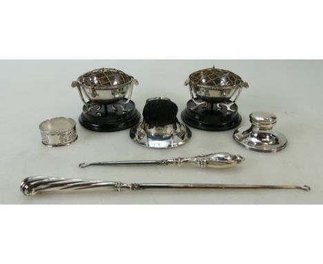 A collection of silver items: Silver pair of salts on wood bases, 202 grams, silver tongs and serviette ring, 47.7 grams, Sil