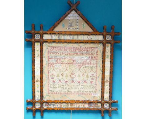 Sampler dated 1872: Gothic style painted wood frame measuring 89cm x 72cm overall.  Sampler dated 1872 by Agnes Bowman.