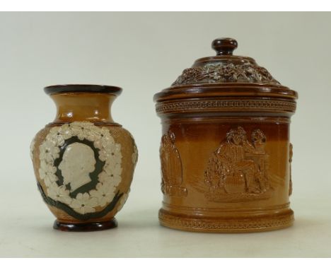 Doulton Lambeth Stoneware items: A Doulton Stoneware jar &amp; cover decorated with embossed hunting scenes height 14cm and a