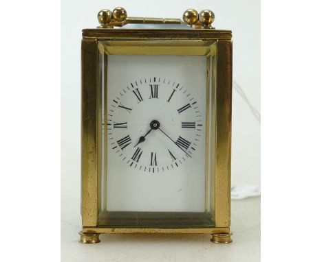 Small brass Carriage Clock: Carriage clock timepiece of small size, no key, not working. One foot missing.  9cm high inc hand