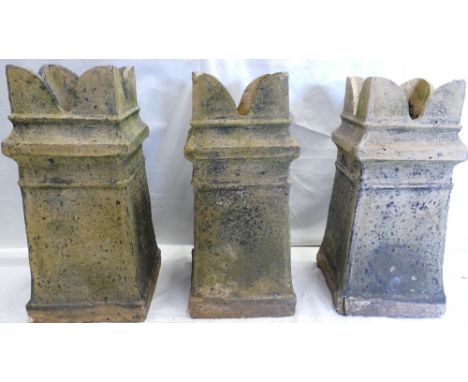 Set of three Vintage Chimney Pots: Three antique matching terracotta castle top chimney pots, height 73cm. (3)
