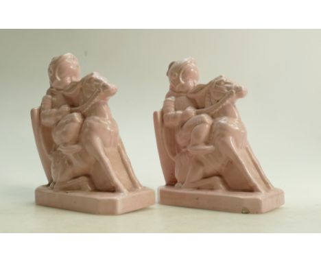 Pair of Richards Tiles Bookends: Richards Tiles Stoneware bookend figures of baby dressed as Knight on donkey, height 19.5cm.