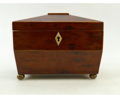 Yew wood Tea Caddy:  George III Yew wood tea caddy of Sarcophagus form, and inlaid with boxwood stringing. One lid split in t